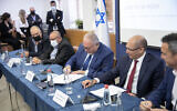 Finance Minister Avigdor Liberman at a press conference at the Ministry of Finance offices in Jerusalem, on November 3, 2021 where the government announced that the minimum wage would rise to NIS 6,000 by 2025. (Olivier Fitoussi/Flash90)