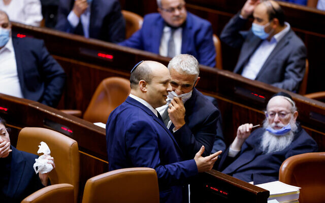 Prime Minister Naftali Bennett during a plenum session to vote on the state budget in the Knesset in Jerusalem, November 3, 2021. (Olivier Fitoussi/Flash90) Prime Minister Naftali Bennett during a plenum session to vote on the state budget in the Knesset in Jerusalem, November 3, 2021. (Olivier Fitoussi/Flash90)