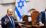 Prime Minister Naftali Bennett speaks ahead of the final votes on the state budget, at the Knesset in Jerusalem, November 3, 2021. (Olivier Fitoussi/Flash90)