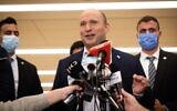 Prime Minister Naftali Bennett speaks to reporters at the Knesset on November 4, 2021. (Yonatan Sindel/Flash90)