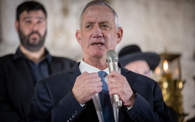 Defense Minister Benny Gantz speaks at a ceremony on the first night the Jewish holiday of Hanukkah at the Western Wall in Jerusalem's Old City, on November 28, 2021. (Flash90) Defense Minister Benny Gantz speaks at a ceremony on the first night the Jewish holiday of Hanukkah at the Western Wall in Jerusalem's Old City, on November 28, 2021. (Flash90)
