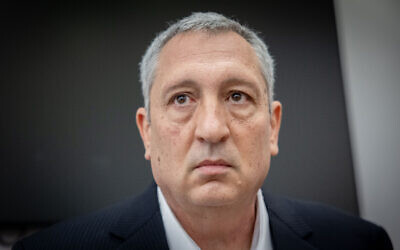 Nir Hefetz arrives for a court hearing at the Jerusalem District Court on November 30, 2021. (Yonatan Sindel/Flash90)