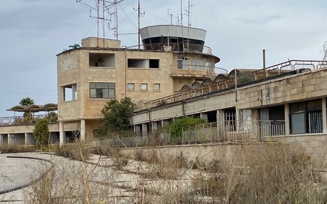 The road and entry point for passengers to the abandoned terminal building of Jerusalem Airport at Atarot, November 2021. (David Horovitz / Times of Israel)