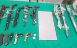 Weapons seized by Israeli security forces during a gun-smuggling attempt along the border with Jordan on November 11, 2021. (Israel Defense Forces)