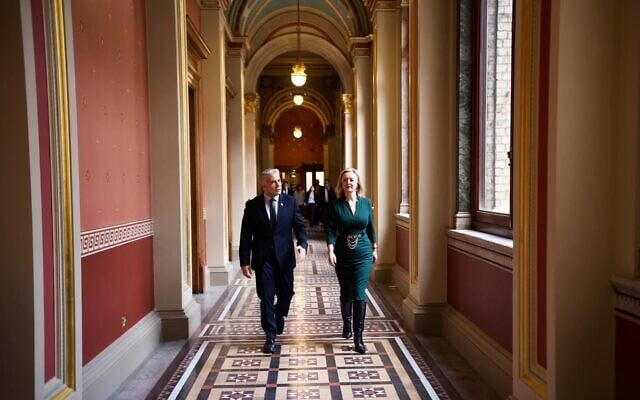 Foreign Minister Yair Lapid (L) walks with UK Foreign Secretary Liz Truss at the Foreign Office, in London, November 29, 2021. (Stuart Mitchell/ GPO) Foreign Minister Yair Lapid (L) walks with UK Foreign Secretary Liz Truss at the Foreign Office, in London, November 29, 2021. (Stuart Mitchell/ GPO)
