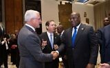 Save A Child's Heart Africa President Haim Taib (L) speaks with Congolese President Felix Tshisekedi (R) as President Isaac Herzog looks on, October 27, 2021 (courtesy)