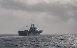 A US Central Command helicopter carrier, the USS Portland, sails in the Arabian sea ahead of two-week special forces exercise with Israel this month, on September 13, 2021. (Sgt. Seth Rosenberg/CENTCOM)