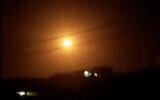 An explosion is seen during a reported Israeli strike near the Syrian city of Homs on November 8, 2021. (Screen capture: Twitter)