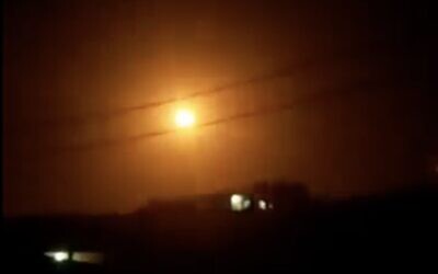 An explosion is seen during a reported Israeli strike near the Syrian city of Homs on November 8, 2021. (Screen capture: Twitter)