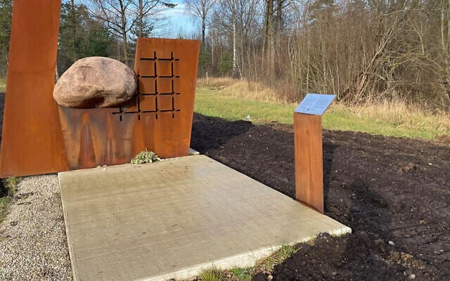 A bicycle path passes on either side of a monument to Holocaust survivors buried in a mass grave in Šiauliai, Lithuania, pictured on Nov. 10, 2021. (Courtesy of Rabbi Kalev Krelin via JTA) A bicycle path passes on either side of a monument to Holocaust survivors buried in a mass grave in Šiauliai, Lithuania, pictured on Nov. 10, 2021. (Courtesy of Rabbi Kalev Krelin via JTA)