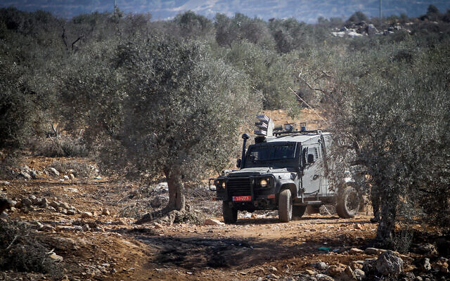 Illustrative: Israeli security forces during clashes with Palestinian protesters in the West Bank, on November 12, 2021. (Nasser Ishtayeh/Flash90) Illustrative: Israeli security forces during clashes with Palestinian protesters in the West Bank, on November 12, 2021. (Nasser Ishtayeh/Flash90)