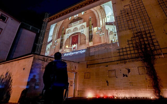 A photo of the synagogue that was on this spot is projected on a bunker in Frankfurt, Germany, Nov. 9, 2021, during a memorial event on the 83th anniversary of the Nazis' anti-Jewish Kristallnacht pogrom in 1938. (AP Photo/Michael Probst) A photo of the synagogue that was on this spot is projected on a bunker in Frankfurt, Germany, Nov. 9, 2021, during a memorial event on the 83th anniversary of the Nazis' anti-Jewish Kristallnacht pogrom in 1938. (AP Photo/Michael Probst)