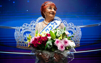 Salina Steinfeld, 86, crowned 'Miss Holocaust Survivor,' poses for a photo during a special beauty pageant honoring Holocaust survivors in Jerusalem, Nov. 16, 2021. (AP Photo/Oded Balilty)