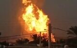 Fire rising from an oil pipeline that exploded in southern Iran on November 17, 2021. (Screenshot: Twitter)