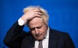 Britain's Prime Minister Boris Johnson speaks during a press conference in London, on November 27, 2021. (Jeff Gilbert/Pool via AP)