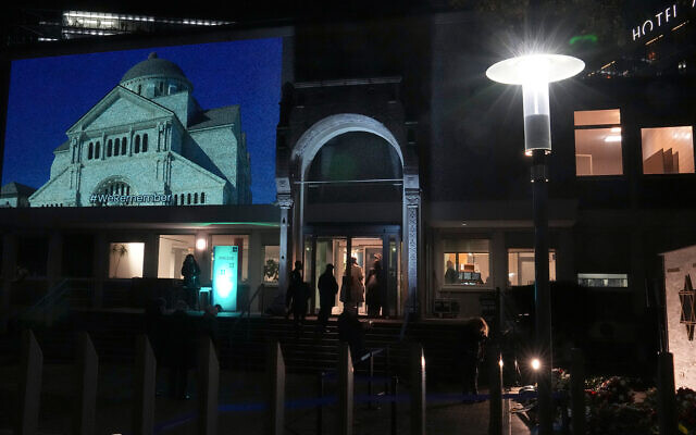 A photo is projected onto the front of the center of the Jewish community, the successor building of the old synagogue, in Berlin, Germany, Nov. 9, 2021 during a memorial event on the 83th anniversary of the Nazis' anti-Jewish Kristallnacht pogrom in 1938. (AP Photo/Michael Sohn) A photo is projected onto the front of the center of the Jewish community, the successor building of the old synagogue, in Berlin, Germany, Nov. 9, 2021 during a memorial event on the 83th anniversary of the Nazis' anti-Jewish Kristallnacht pogrom in 1938. (AP Photo/Michael Sohn)