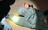 A Palestinian allegedly shot in the hand by settlers during clashes near an illegal Israeli outpost in the south Hebron hills on November 10, 2021 (courtesy)