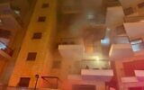 A fire seen in a residental building in Haifa, Novemmber 19, 2021. (Israel Fire and Rescue Services)