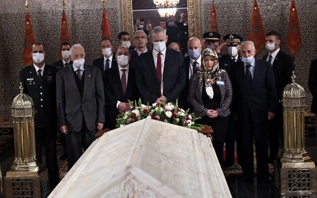 Defense Minister Benny Gantz, center, visits the Tomb of Moroccan King Muhammad V in Rabat on November 24, 2021. (Defense Ministry) Defense Minister Benny Gantz, center, visits the Tomb of Moroccan King Muhammad V in Rabat on November 24, 2021. (Defense Ministry)