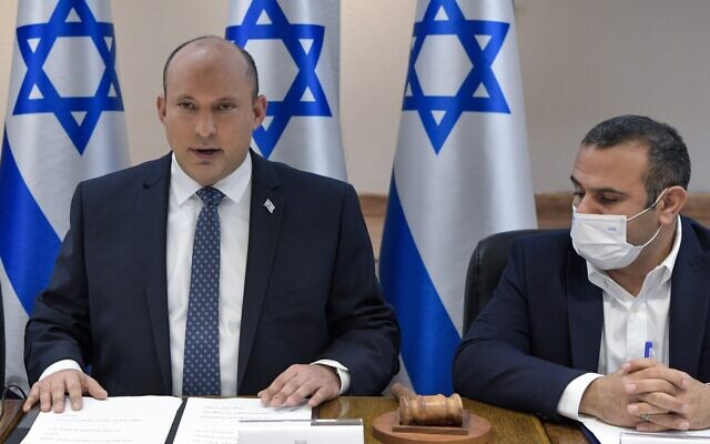 Prime Minister Naftali Bennett (left) opens a meeting of the coronavirus cabinet, on November 17, 2021. (Kobi Gideon/GPO) Prime Minister Naftali Bennett (left) opens a meeting of the coronavirus cabinet, on November 17, 2021. (Kobi Gideon/GPO)
