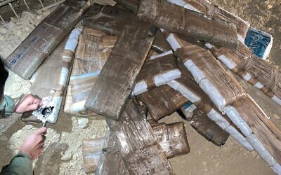 Cocaine and marijuana seized during a smuggling attempt on the Egypt border, on November 20, 2021. (Israel Defense Forces)