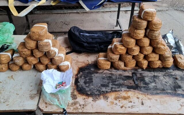 Drugs and ammunition seized during a smuggling attempt on the Lebanon border, on November 20, 2021. (Israel Defense Forces) Drugs and ammunition seized during a smuggling attempt on the Lebanon border, on November 20, 2021. (Israel Defense Forces)