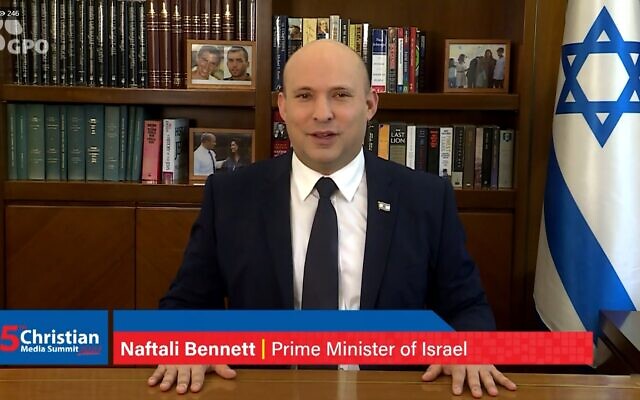 Prime Minister Naftali Bennett addresses the Fifth Annual Christian Media Summit in Jerusalem, on November 11, 2021. (Screenshot)