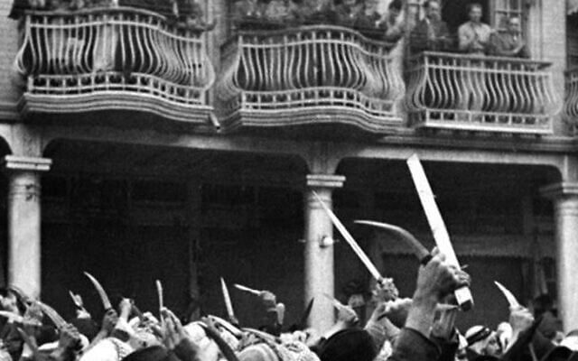 An Iraqi mob threatens Baghdad's Jews during the massacre known as the Farhud, June 1-2, 1941 (Yad Ben Zvi Photo Archive)