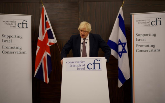 UK Prime Minister Boris Johnson speaks to Conservative Friends of Israel in London, Britain, alongside Israel's Foreign Minister Yair Lapid, November 29, 2021. (Stuart Mitchell) UK Prime Minister Boris Johnson speaks to Conservative Friends of Israel in London, Britain, alongside Israel's Foreign Minister Yair Lapid, November 29, 2021. (Stuart Mitchell)