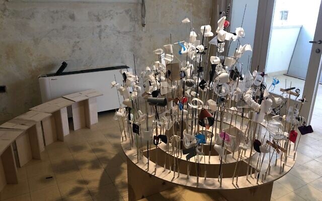 Industrial designer Yaacov Kaufman's 'XO' exhibit of plastic 'flowers' at Tel Aviv's Liebling House, which opened October 28, 2021 (Jessica Steinberg/Times of Israel)