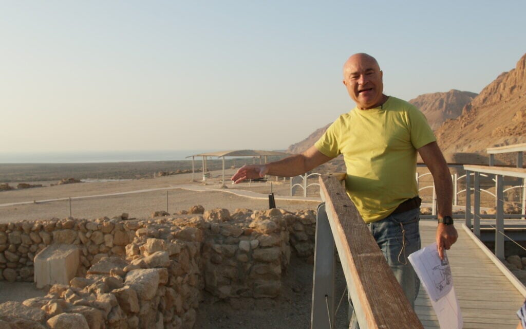 Dr. Daniel Vainstub points out the various historical sites at Qumran National Park, October 2021. (Shmuel Bar-Am)
