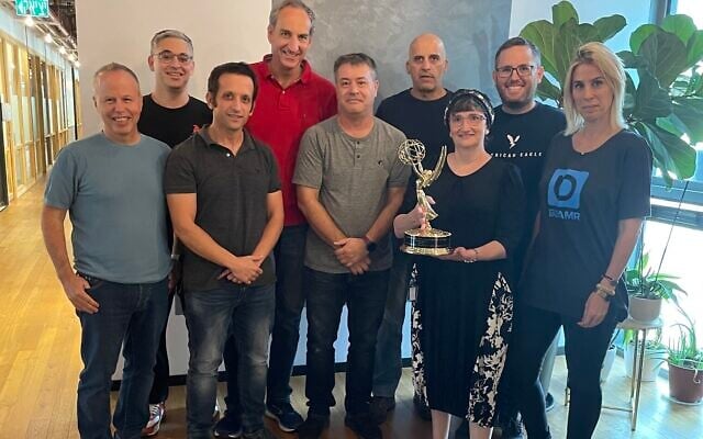 The team from Israeli company Beamr holding the Emmy they won in 2021 for developing patented video compression tech used in the TV and video streaming industry. (Courtesy) The team from Israeli company Beamr holding the Emmy they won in 2021 for developing patented video compression tech used in the TV and video streaming industry. (Courtesy)