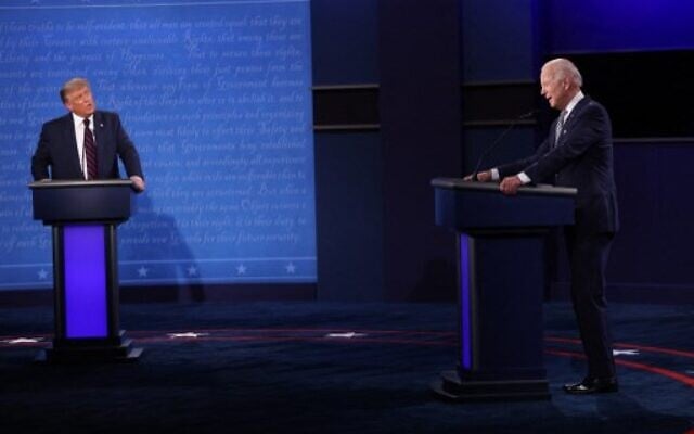 In this file photo taken on September 29, 2020, then-US President Donald Trump and Democratic presidential nominee Joe Biden participate in the first presidential debate at the Health Education Campus of Case Western Reserve University in Cleveland, Ohio. (WIN MCNAMEE / AFP) In this file photo taken on September 29, 2020, then-US President Donald Trump and Democratic presidential nominee Joe Biden participate in the first presidential debate at the Health Education Campus of Case Western Reserve University in Cleveland, Ohio. (WIN MCNAMEE / AFP)