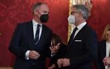 Austria's newly appointed Minister of the Interior Gerhard Karner (L) and Austria's newly appointed Minister of Finance Magnus Brunner talk, prior a swearing-in ceremony of the new Chancellor at the Presidential Hofburg palace in Vienna, Austria on December 6, 2021. Austria's Interior Minister Karl Nehammer is due to be sworn in as the country's third chancellor in as many months on December 6, capping a turbulent few days in the country's politics. (JOE KLAMAR / AFP)