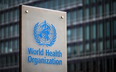 This photograph taken on December 7, 2021, shows a sign of the World Health Organization (WHO) at its headquarters in Geneva. (Fabrice Coffrini/AFP)