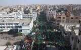 People participate in a rally in the Jabaliya refugee camp in the Gaza Strip, marking the 34th anniversary of the founding of Hamas, which rules the coastal enclave, on December 10, 2021. (Mohammed Abed/AFP)