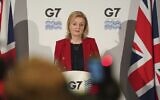 Britain's Foreign Secretary Liz Truss speaks at a press conference on the final day of the G7 foreign ministers summit in Liverpool, north-west England on December 12, 2021. (Jon Super / POOL / AFP)