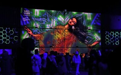 People attend the Soundstorm music festival, organized by MDLBEAST, in Banban on the outskirts of the Saudi capital Riyadh on December 16, 2021. (Fayez Nureldine / AFP)
