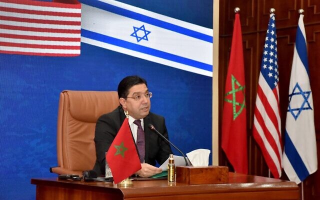 Illustrative: Moroccan Foreign Minister Nasser Bourita takes part in a virtual meeting with his US and Israeli counterparts, at his office in the capital Rabat, on December 22, 2021. (AFP) Illustrative: Moroccan Foreign Minister Nasser Bourita takes part in a virtual meeting with his US and Israeli counterparts, at his office in the capital Rabat, on December 22, 2021. (AFP)