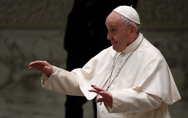 Pope Francis during an audience with Vatican employees for the Christmas greetings, in the Paul VI Hall at the Vatican, on December 23, 2021. (Filippo Monteforte/AFP)