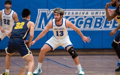 Ofek Reef regularly scores in double-figures for the Yeshiva University men’s basketball team, currently enjoying the longest streak in men’s college basketball. (Courtesy YU/ via JTA)