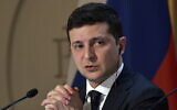 Ukrainian President Volodymyr Zelensky gives a news conference at the Elysee Palace in Paris, December 9, 2019. (Alexei Nikolsky/TASS/Getty Images via JTA)