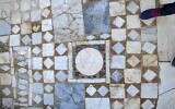 The floor of the synagogue in Side, Turkey, features a plaque with Greek and Hebrew inscriptions. (Jonathan Lansey/https://www.twitter.com/JLansey via JTA)