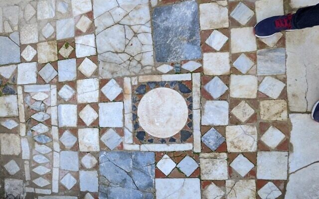 The floor of the synagogue in Side, Turkey, features a plaque with Greek and Hebrew inscriptions. (Jonathan Lansey/https://www.twitter.com/JLansey via JTA) The floor of the synagogue in Side, Turkey, features a plaque with Greek and Hebrew inscriptions. (Jonathan Lansey/https://www.twitter.com/JLansey via JTA)