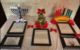 A picture of a menorah intended to explain the object's symbolism was actually a Messianic image in which the menorah's branches were described as symbolizing the 'cross' and 'resurrection.' (Screenshot from Facebook/ via JTA)
