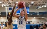 Ryan Turell plays in a game for the Yeshiva University Maccabees. (Courtesy of Yeshiva University via JTA)