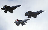 An illustrative photo of a US Air Force F-16, below, escorting two F-35 jets, above, September 2015. (AP Photo/Rick Bowmer, File)