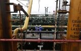 Crewmen speak aboard the Iranian oil tanker Fortune during its arrival to El Palito refinery near Puerto Cabello, Venezuela, May 25, 2020. (AP Photo/Ernesto Vargas)