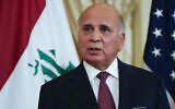 Iraq's Foreign Minister Fuad Hussein listens as he and US Secretary of State Antony Blinken face reporters as they meet at the State Department in Washington, DC, on July 23, 2021. (Elizabeth Frantz/Pool via AP)