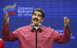 Venezuela's President Nicolas Maduro talks to journalist covering his vote in elections to choose members of the National Assembly in Caracas, Venezuela, Dec. 6, 2020. (Ariana Cubillos/AP)